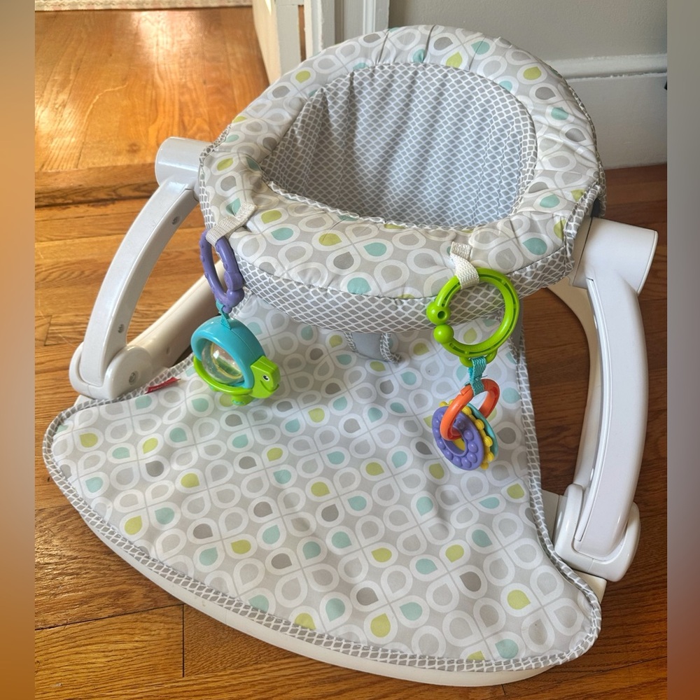 Fisher-Price Sit-Me-Up floor seat with developmental toys and washable cover